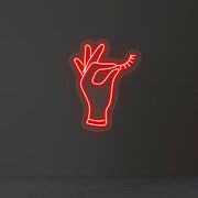 Hand Holding Eyelash Neon Sign image 0