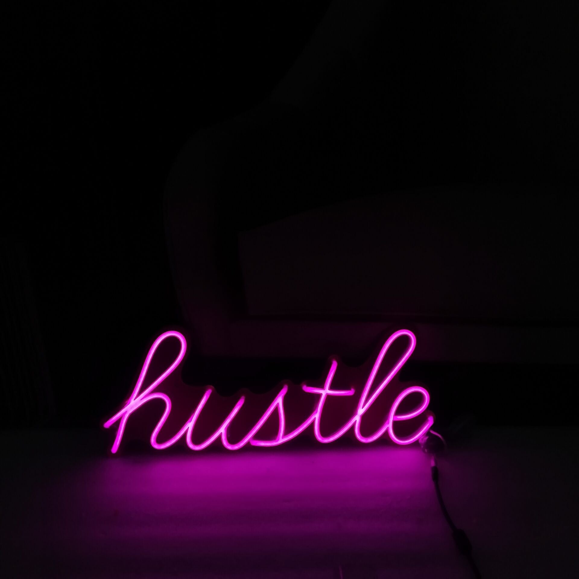 Hustle LED Neon Sign in Hot Pink