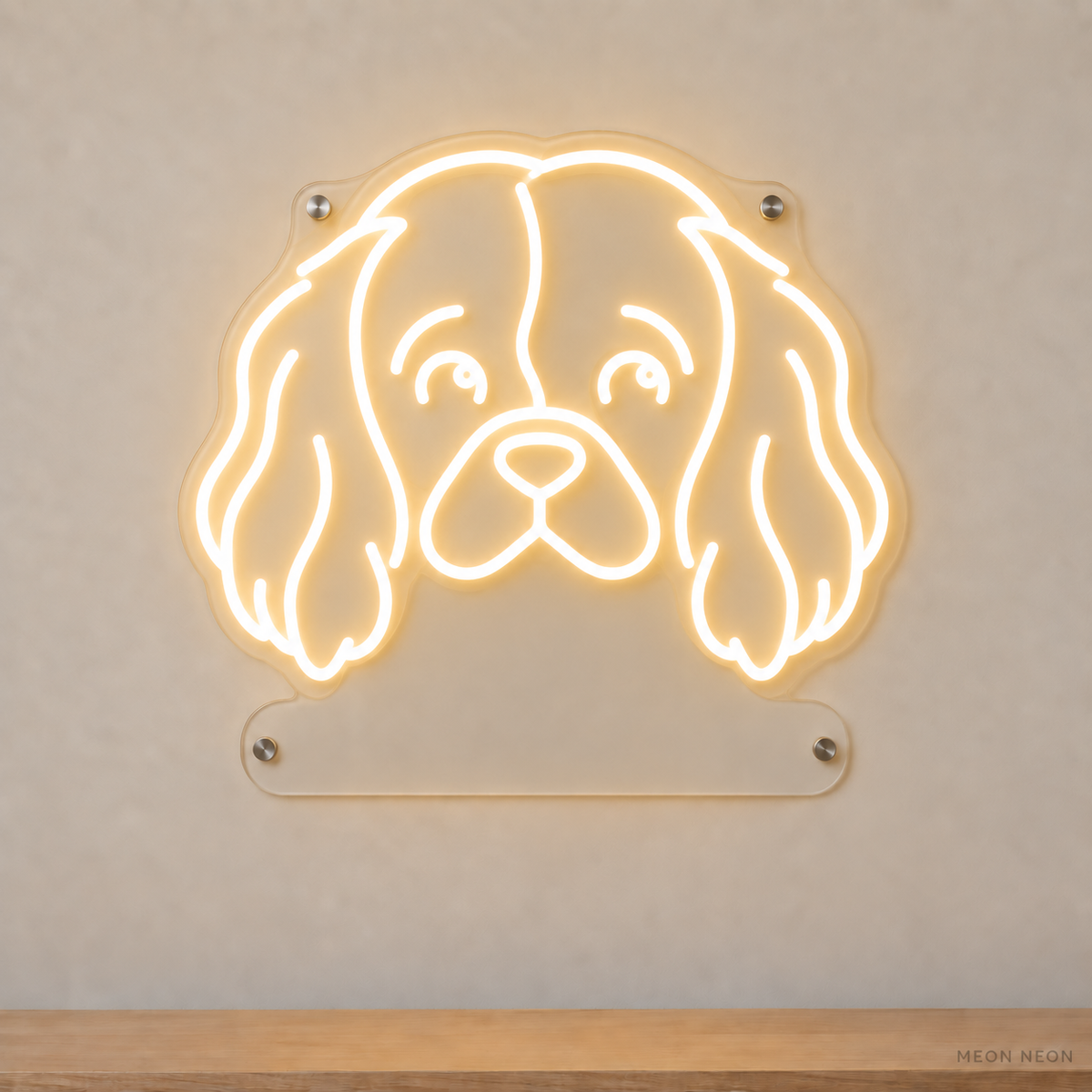 MEON NEON-watermarked concept mockup of a Warm White Cavalier King Charles Spaniel head LED neon sign with a blank acrylic area for a UV-printed breed caption or dog name.