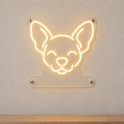 MEON NEON-watermarked concept mockup of a Warm White Chihuahua head LED neon sign with a blank acrylic area for a UV-printed breed caption or dog name.