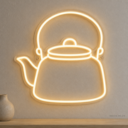 Watermarked concept mockup of Mini Camp Kettle LED Neon Sign in Warm White on a clear acrylic backboard.
