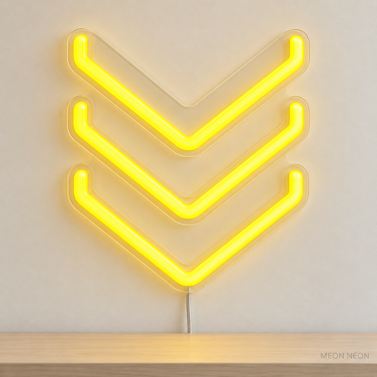 Watermarked concept mockup of Mini Deco Chevron LED Neon Sign in Yellow on a clear acrylic backboard.