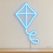 Watermarked concept mockup of Mini Diamond Kite LED Neon Sign in Ice Blue on a clear acrylic backboard.