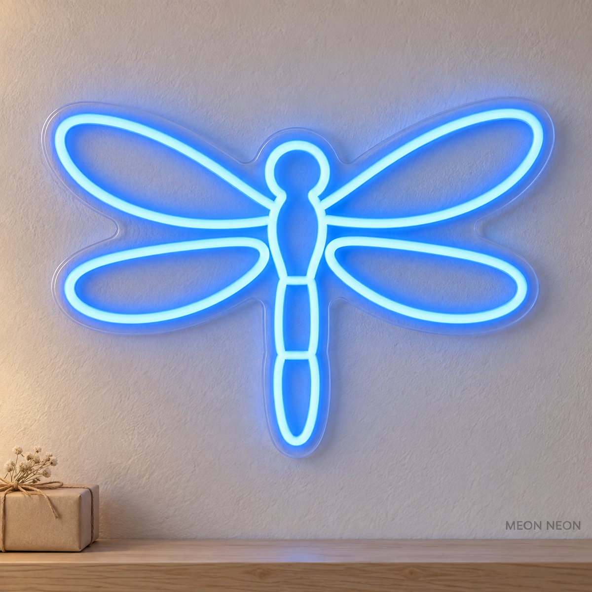 Watermarked concept mockup of the Mini Dragonfly LED Neon Sign in Blue on a clear acrylic backboard.