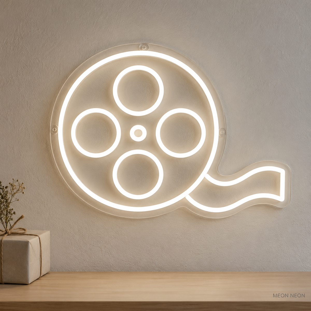 Watermarked concept mockup of the Mini Film Reel LED Neon Sign in White on a clear acrylic backboard.