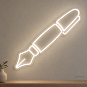 Watermarked concept mockup of Mini Fountain Pen LED Neon Sign in White on a clear acrylic backboard.
