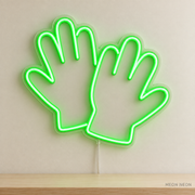 Watermarked concept mockup of Mini Garden Gloves LED Neon Sign in Green on a clear acrylic backboard.