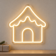Watermarked concept mockup of the Mini Gingerbread House LED Neon Sign in Warm White on a clear acrylic backboard.