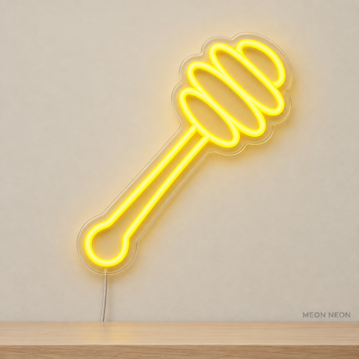 Watermarked concept mockup of Mini Honey Dipper LED Neon Sign in Yellow on a clear acrylic backboard.