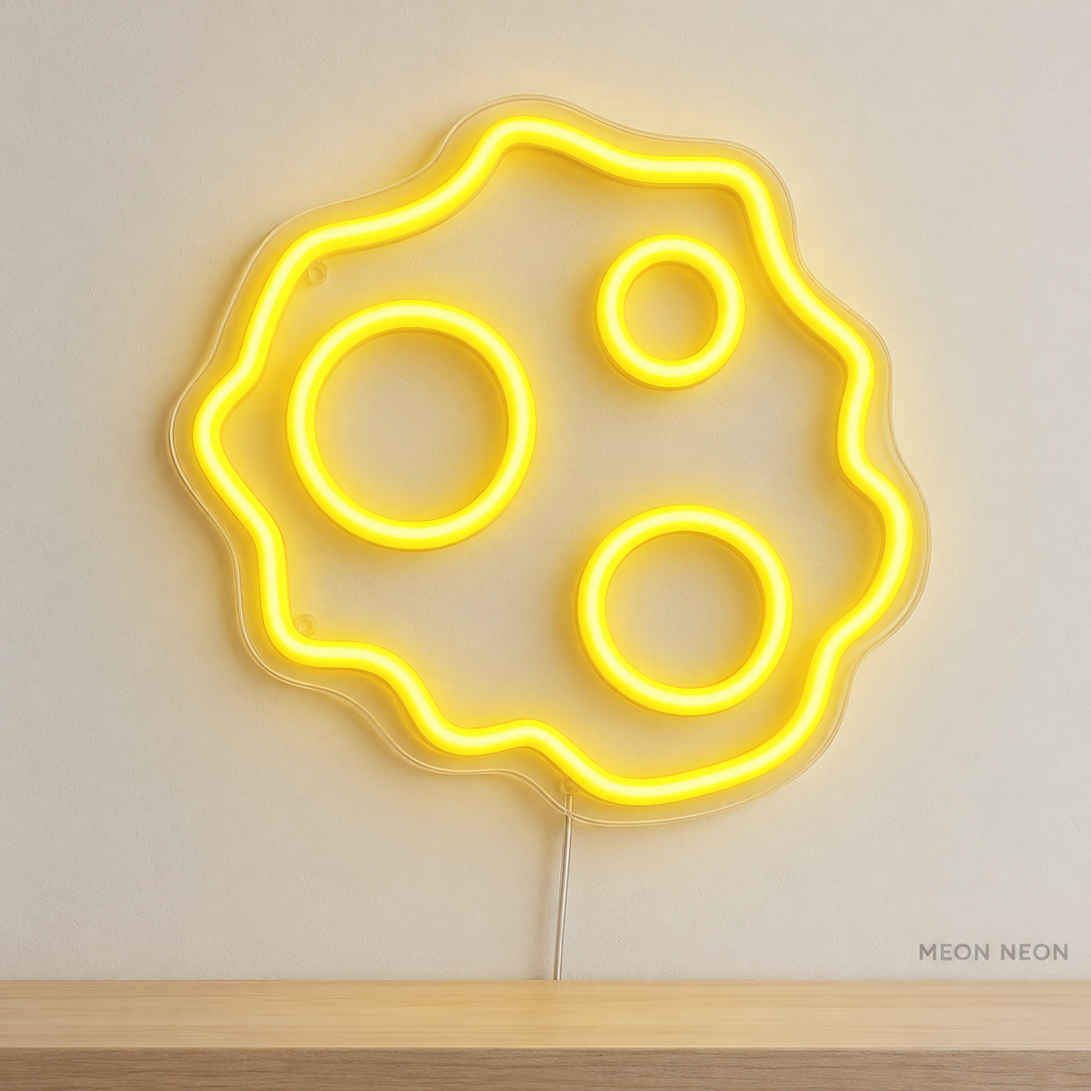 Watermarked concept mockup of Mini Meteorite LED Neon Sign in Yellow on a clear acrylic backboard.
