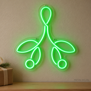 Watermarked concept mockup of the Mini Mistletoe Loop LED Neon Sign in Green on a clear acrylic backboard.