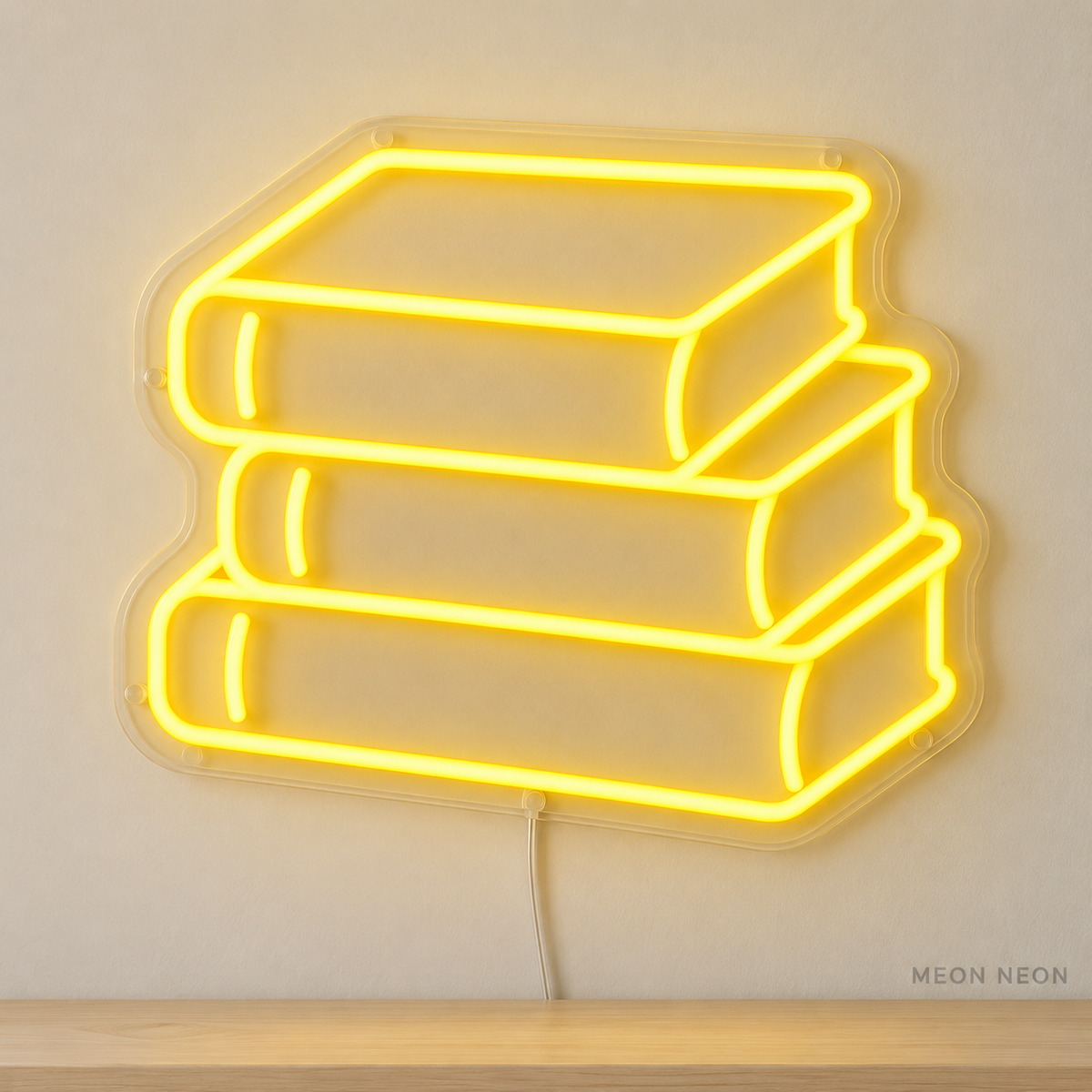 Watermarked concept mockup of Mini Notebook Stack LED Neon Sign in Yellow on a clear acrylic backboard.