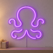 Watermarked concept mockup of the Mini Octopus LED Neon Sign in Purple on a clear acrylic backboard.