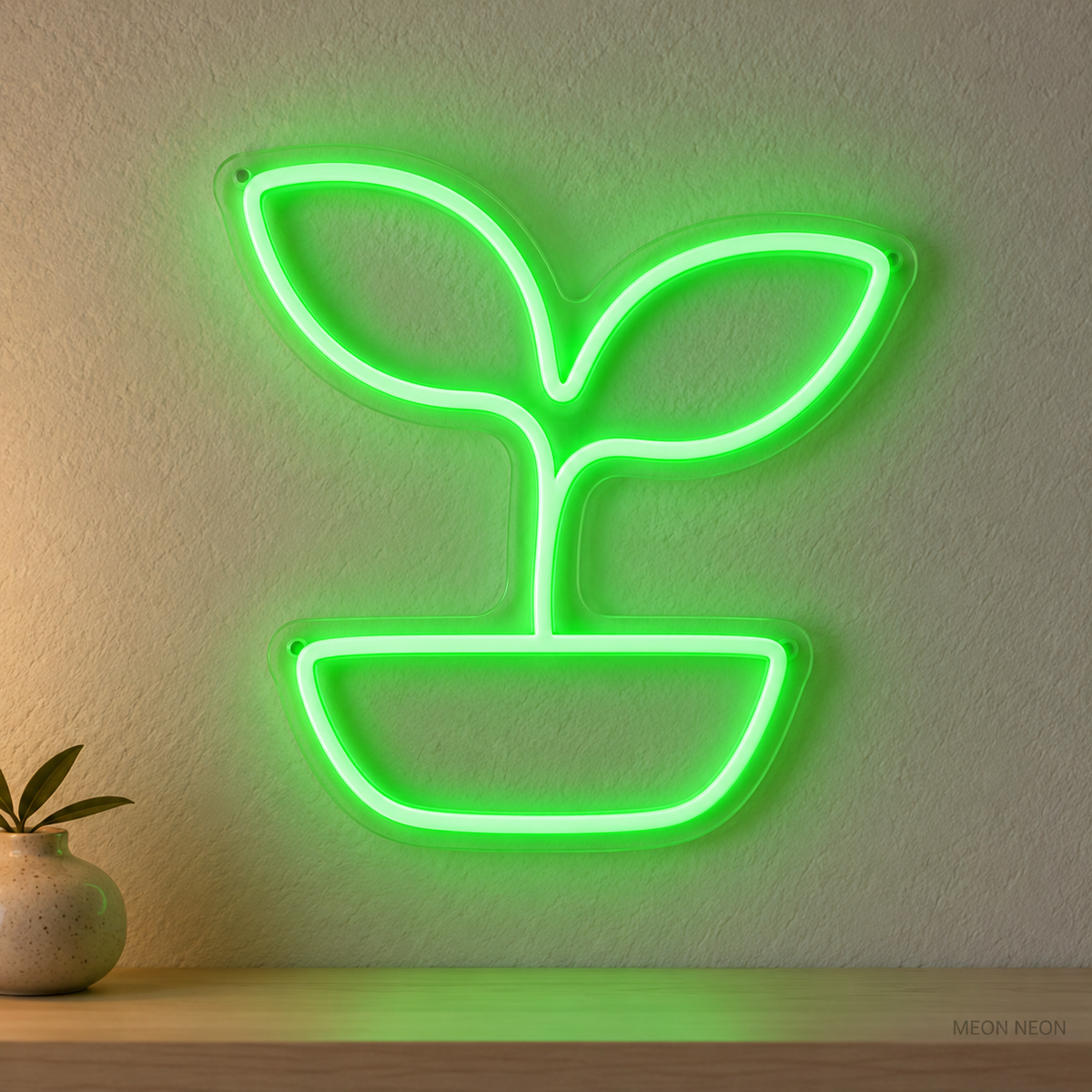 Watermarked concept mockup of Mini Seedling LED Neon Sign in Green on a clear acrylic backboard.