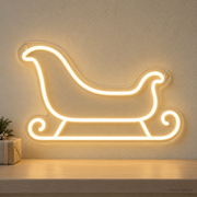 Watermarked concept mockup of the Mini Sleigh LED Neon Sign in Warm White on a clear acrylic backboard.