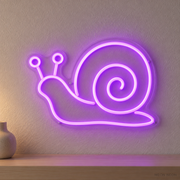 Watermarked concept mockup of Mini Snail LED Neon Sign in Purple on a clear acrylic backboard.