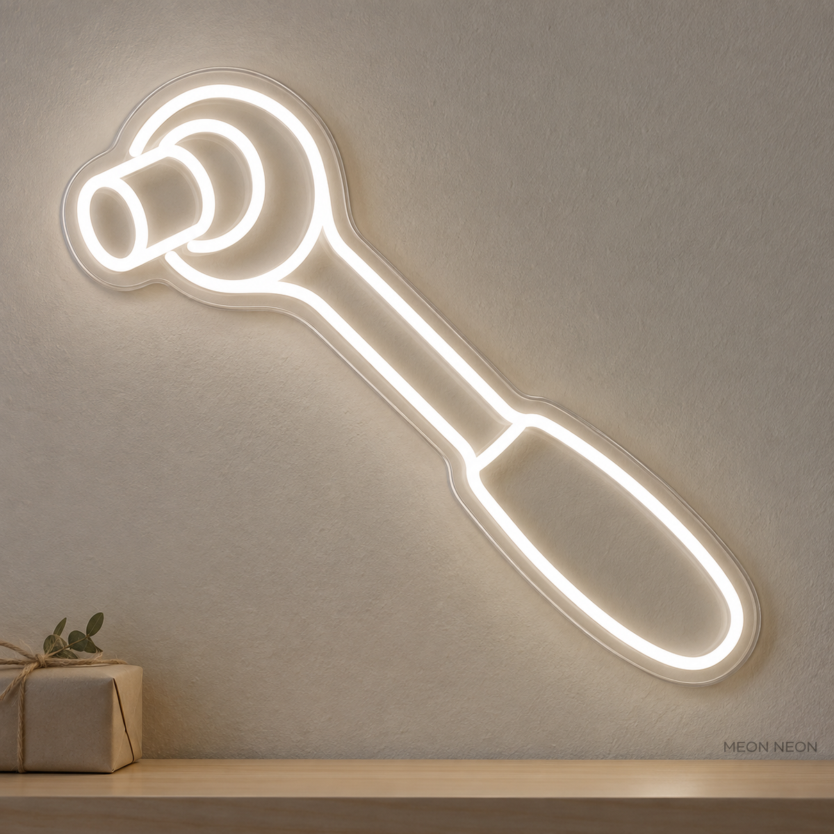 Watermarked concept mockup of the Mini Socket Ratchet LED Neon Sign in White on a clear acrylic backboard.