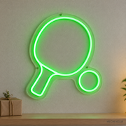 Watermarked concept mockup of the Mini Table Tennis Paddle LED Neon Sign in Green on a clear acrylic backboard.