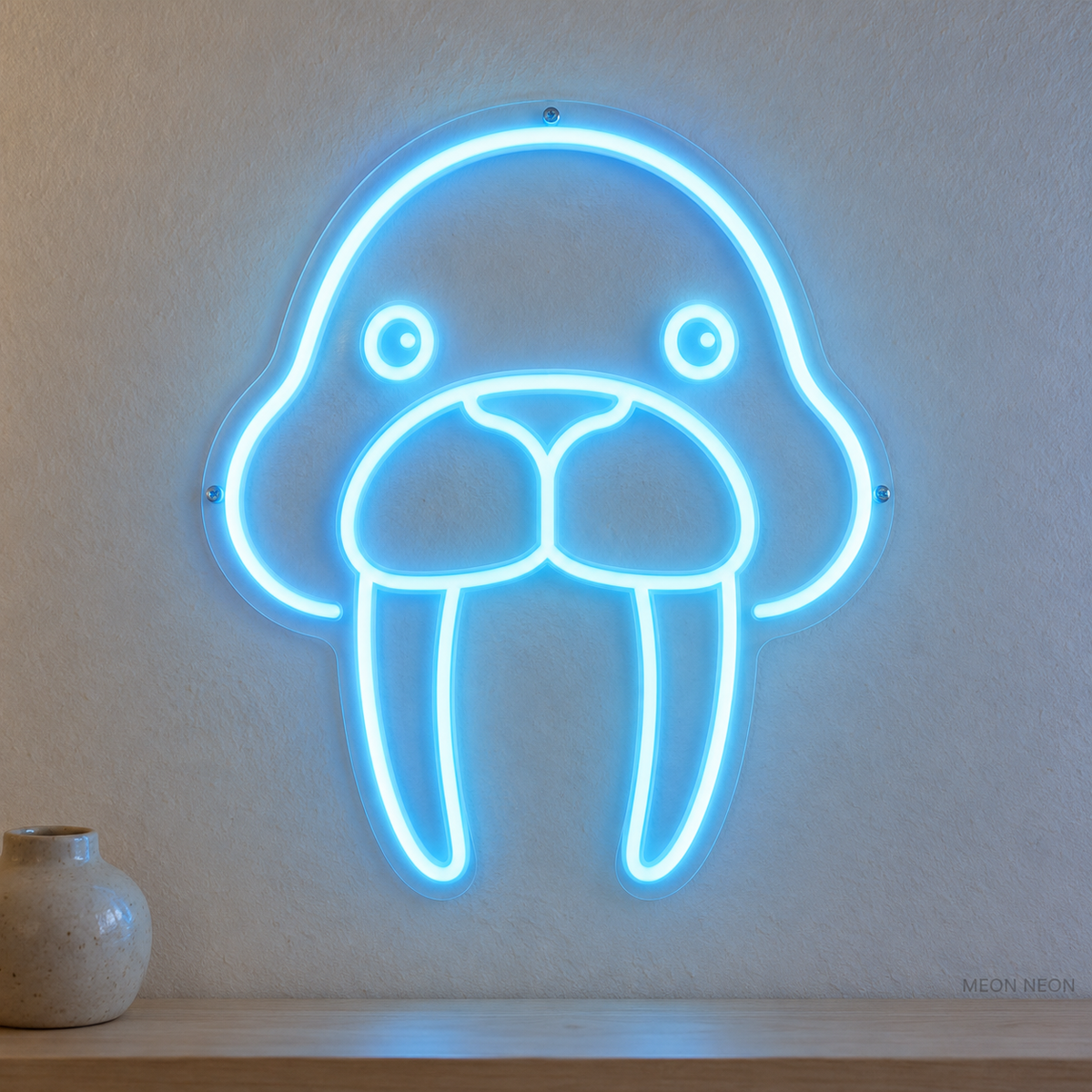 Watermarked concept mockup of Mini Walrus LED Neon Sign in Ice Blue on a clear acrylic backboard.