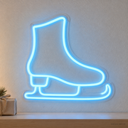 Watermarked concept mockup of the Mini Winter Skate LED Neon Sign in Ice Blue on a clear acrylic backboard.