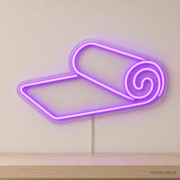Watermarked concept mockup of Mini Yoga Mat LED Neon Sign in Purple on a clear acrylic backboard.