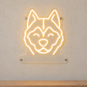 MEON NEON-watermarked concept mockup of a Warm White Siberian Husky head LED neon sign with a blank acrylic area for a UV-printed breed caption or dog name.